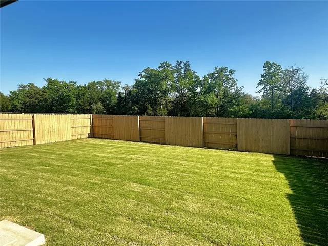 a view of an outdoor space and a yard