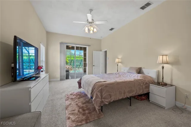 a bedroom with bed and window