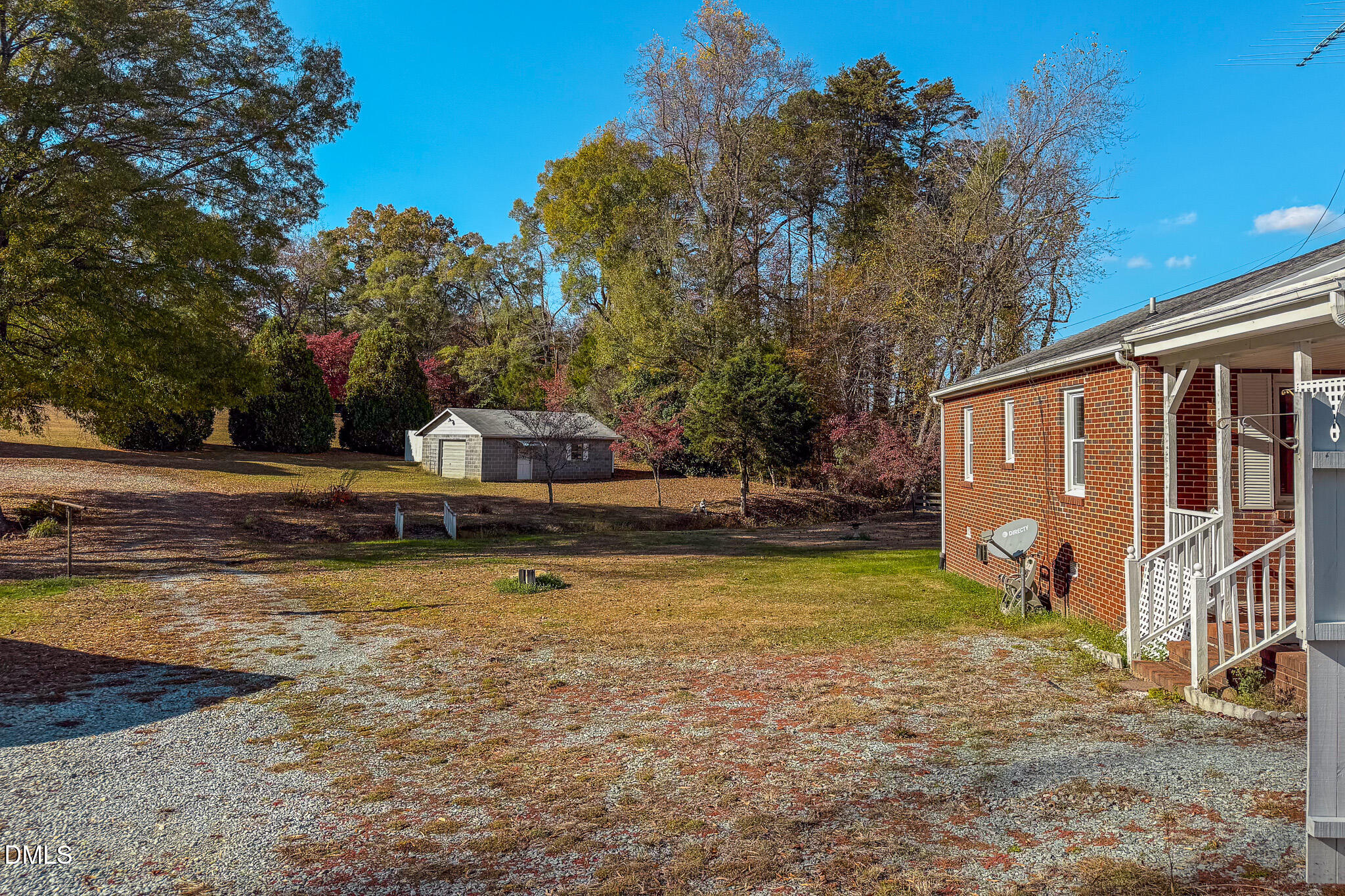 7270 Durham Road Timberlake, NC 27583 - Photo 14 of 33 a view of a house with backyard and sitting area