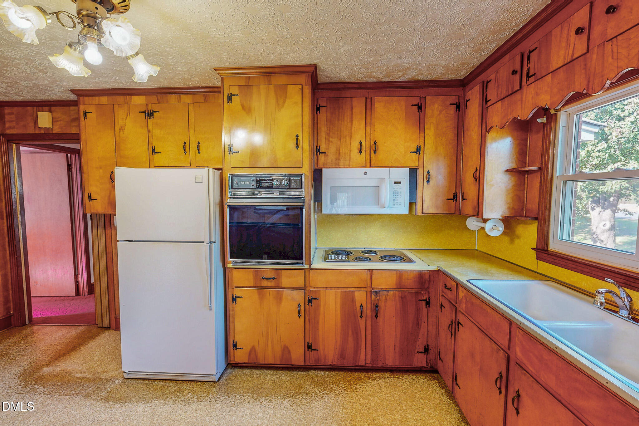 7270 Durham Road Timberlake, NC 27583 - Photo 18 of 33 a kitchen with stainless steel appliances granite countertop a refrigerator a sink and dishwasher