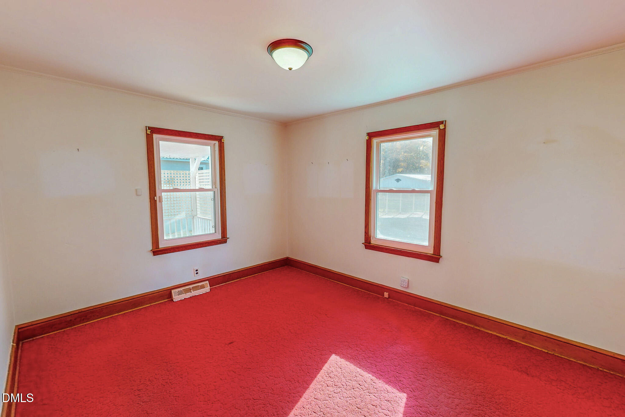 7270 Durham Road Timberlake, NC 27583 - Photo 23 of 33 an empty room with a window