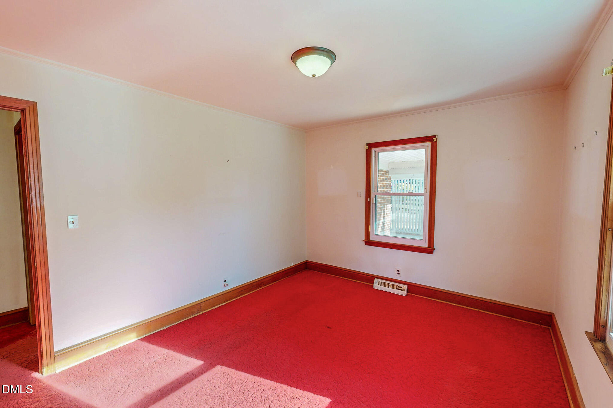 7270 Durham Road Timberlake, NC 27583 - Photo 24 of 33 a view of a room with window and ceiling fan