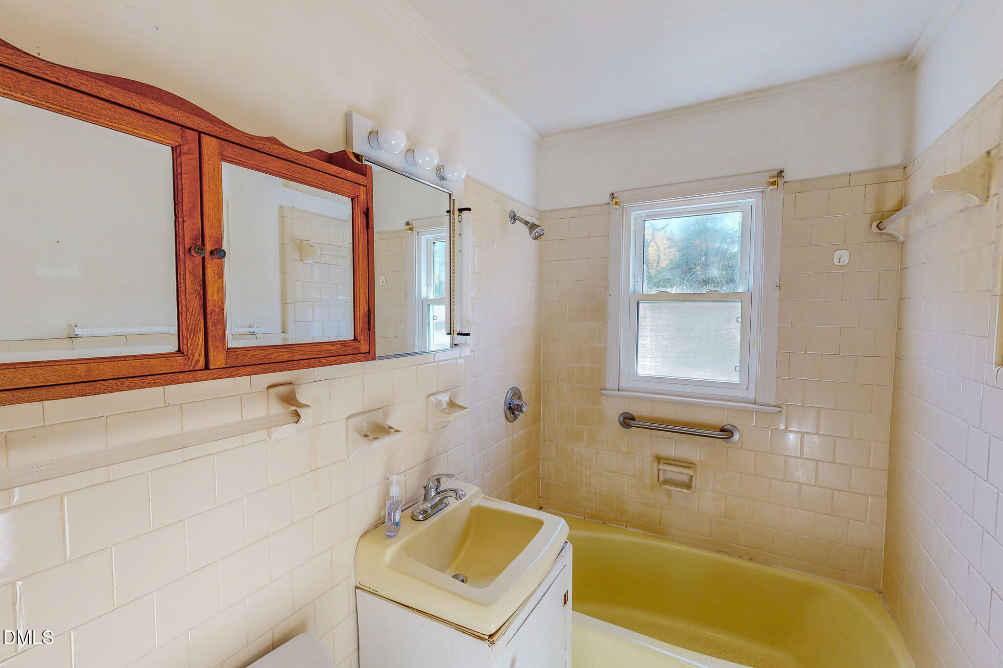 7270 Durham Road Timberlake, NC 27583 - Photo 25 of 33 a bathroom with a sink and a bathtub