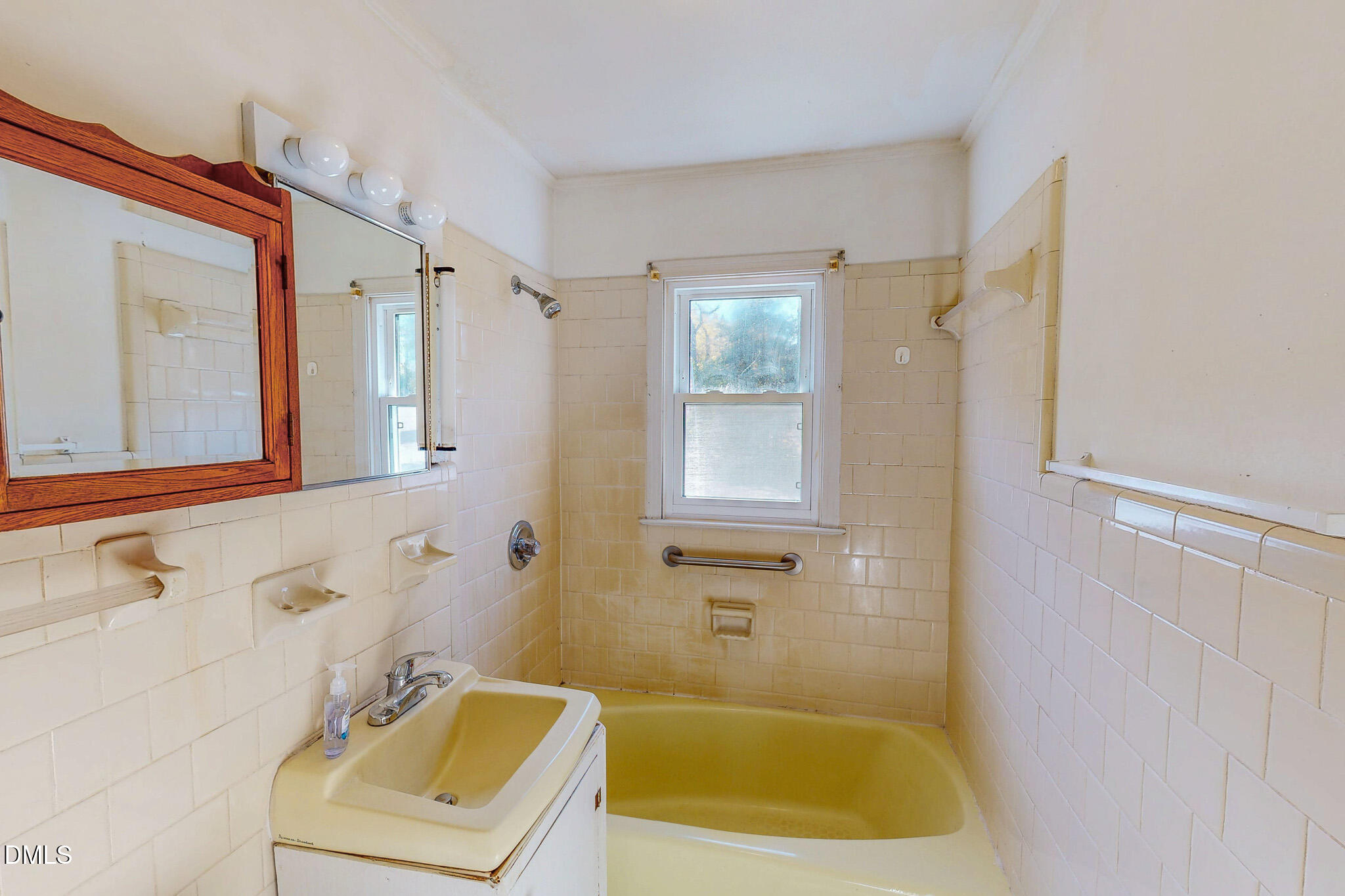 7270 Durham Road Timberlake, NC 27583 - Photo 26 of 33 a bathroom with a sink and a bathtub