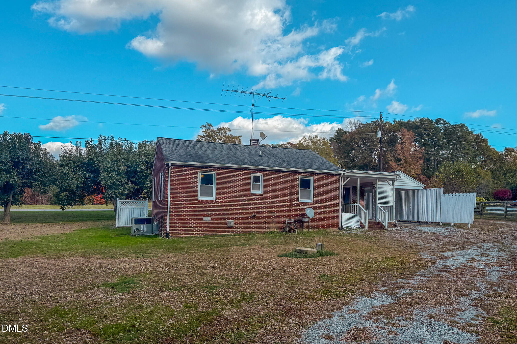 7270 Durham Road Timberlake, NC 27583 - Photo 32 of 33 a view of a house with a yard