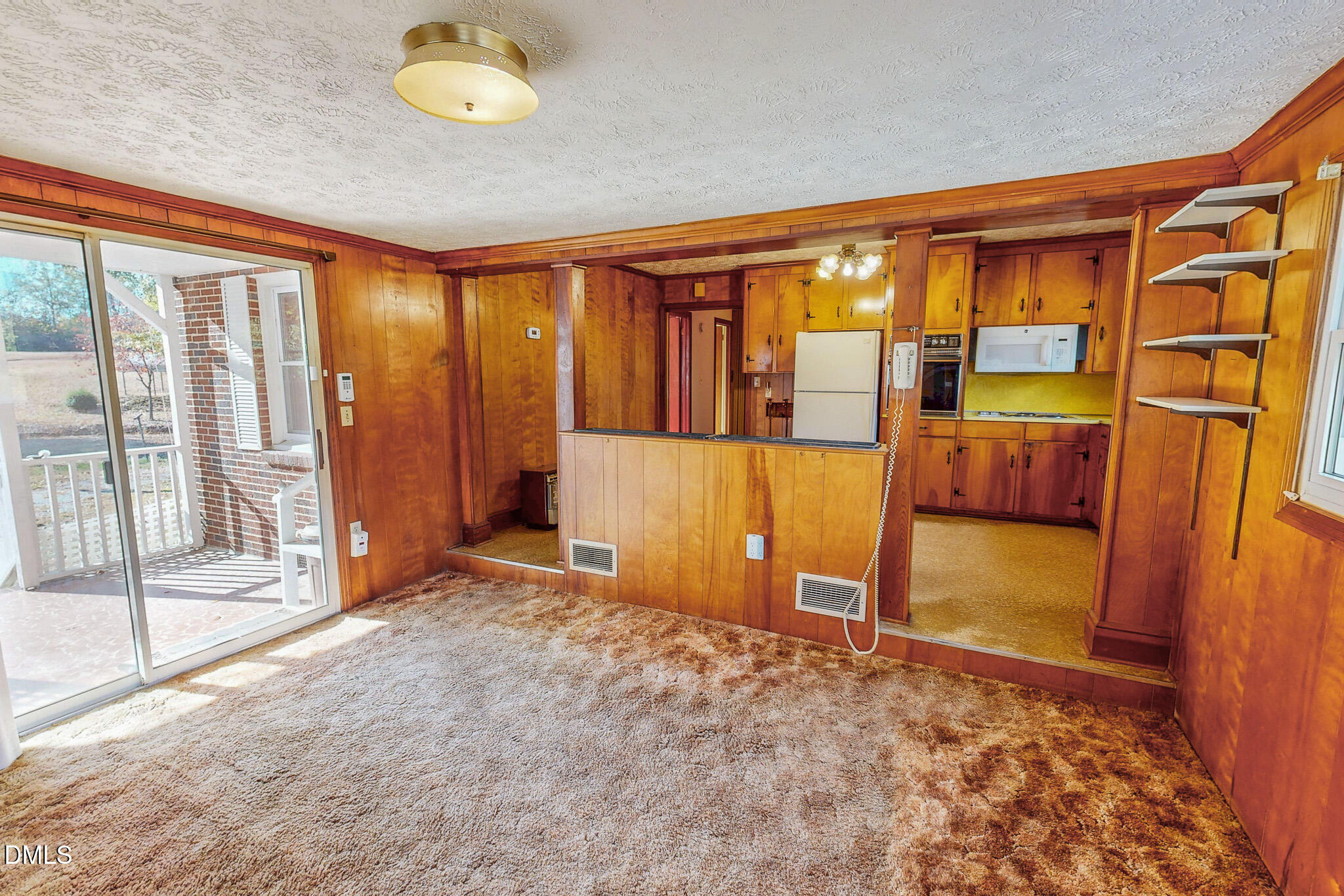 7270 Durham Road Timberlake, NC 27583 - Photo 4 of 33 a view of an empty room and a window