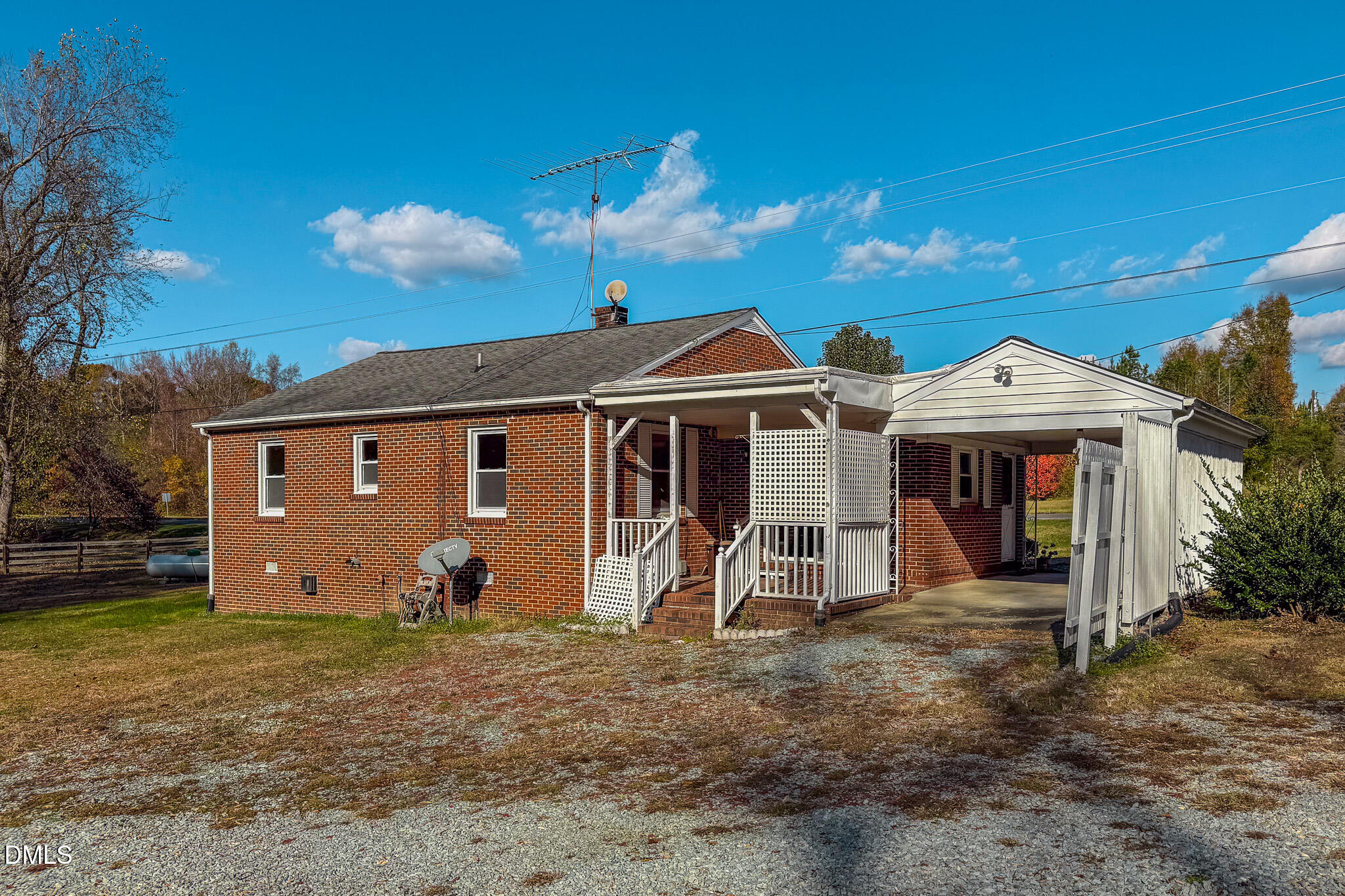 7270 Durham Road Timberlake, NC 27583 - Photo 5 of 33 a view of a house with wooden fence