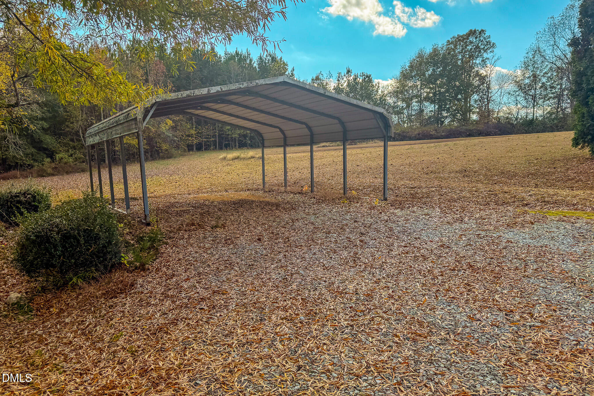 7270 Durham Road Timberlake, NC 27583 - Photo 8 of 33 a backyard of a house with table and chairs
