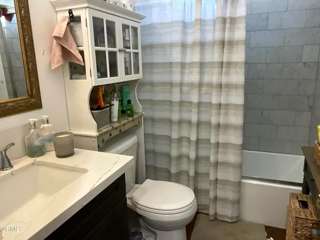 a bathroom with a sink and a toilet