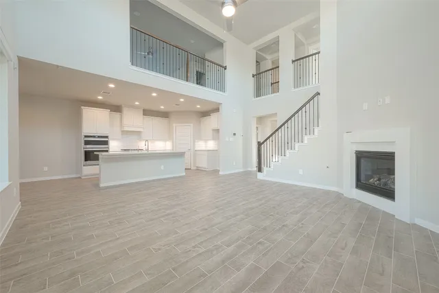 a view of kitchen with cabinets and wooden floor