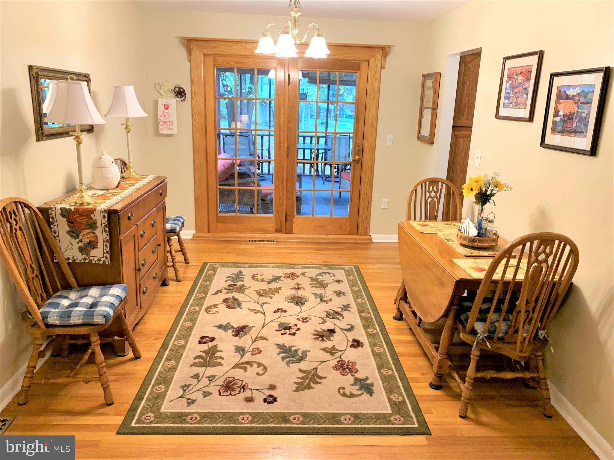 4575 Dave Rill Road Hampstead, MD 21074 - Photo 6 of 23 Dining Room looking out to screened porch
