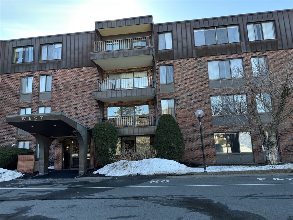 1004 Paradise Road, Unit 1K Swampscott, MA 01907 - Photo 1 of 37 a front view of a building