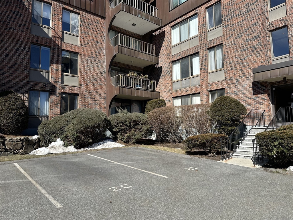 1004 Paradise Road, Unit 1K Swampscott, MA 01907 - Photo 2 of 37 a view of a building with a street