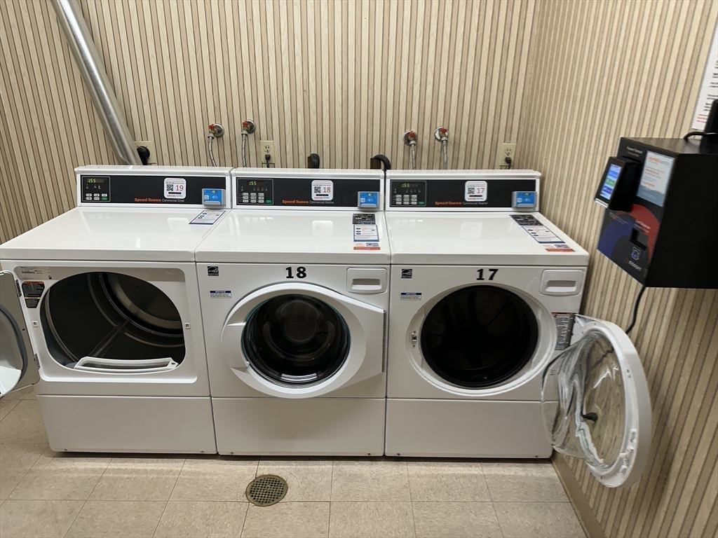 1004 Paradise Road, Unit 1K Swampscott, MA 01907 - Photo 27 of 37 a utility room with dryer and washer