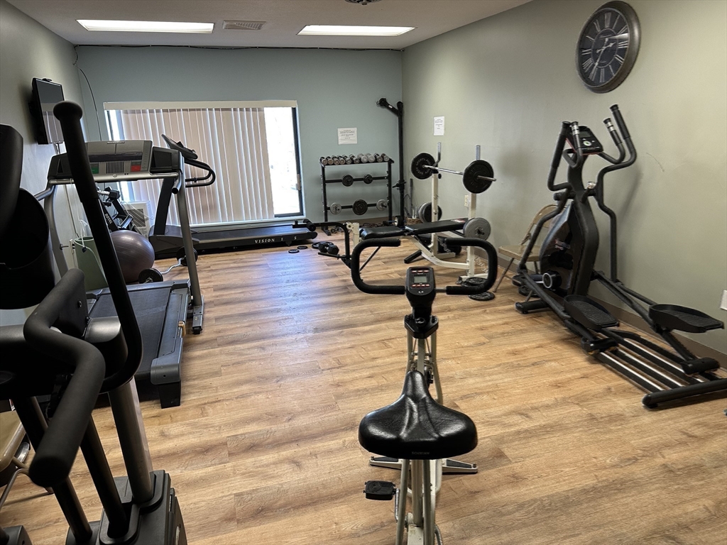 1004 Paradise Road, Unit 1K Swampscott, MA 01907 - Photo 34 of 37 a view of a room with gym equipment