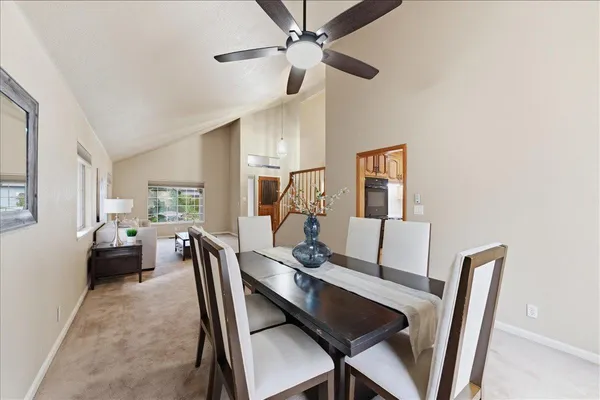 a view of a dining room with furniture