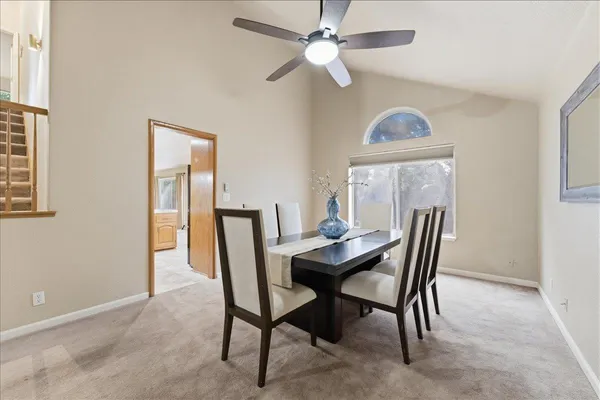 a view of a dining room with furniture