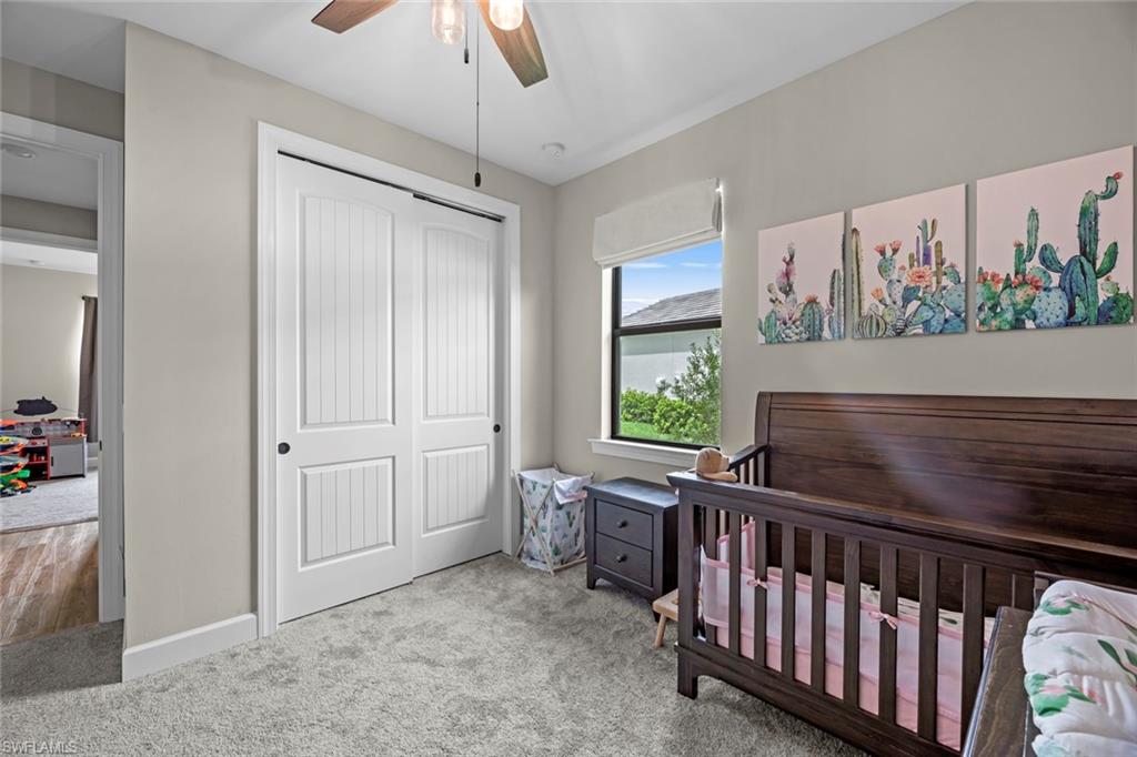 19648 Beechcrest Place Estero, FL 33928 - Photo 15 of 34 a view of a porch with furniture and garden
