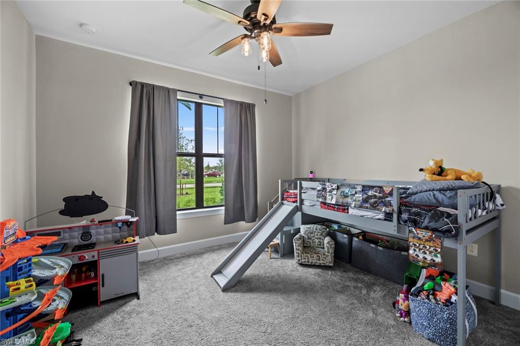 19648 Beechcrest Place Estero, FL 33928 - Photo 17 of 34 a room with storage and utility