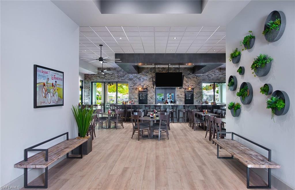 19648 Beechcrest Place Estero, FL 33928 - Photo 33 of 34 a very nice looking room with many windows and furniture