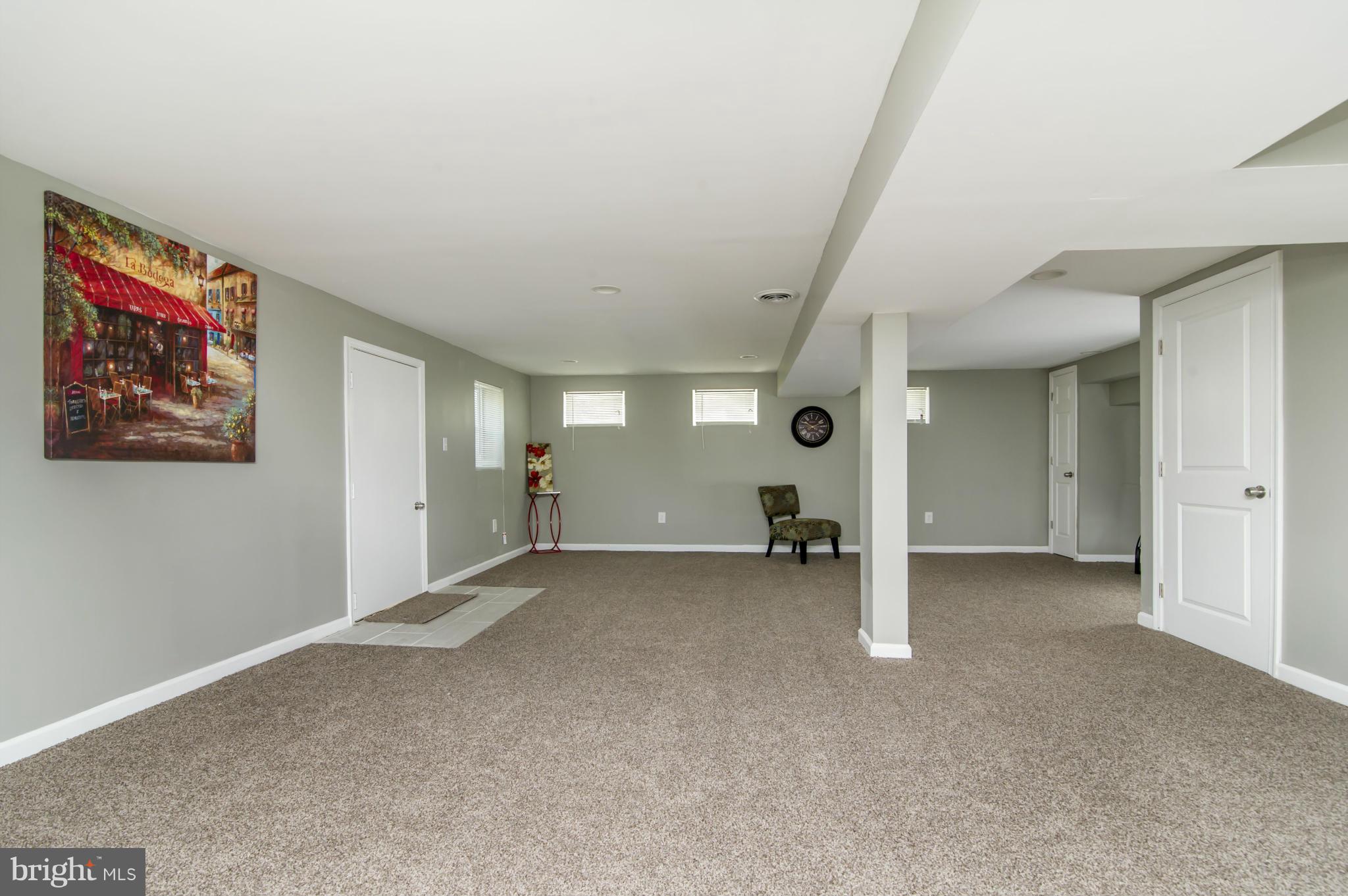 1210 3rd Road Baltimore, MD 21220 - Photo 23 of 26 an empty room with windows