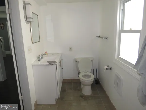 a bathroom with a sink and a toilet
