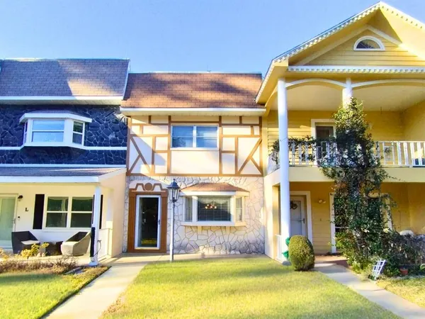 a view of a building with a swimming pool