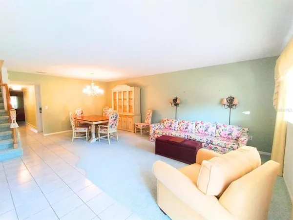 a living room with furniture and a couch