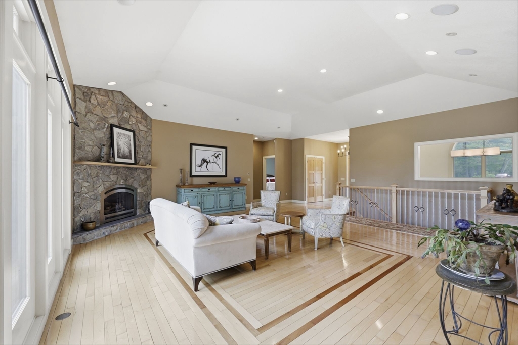 33 Labrie Lane Holyoke, MA 01040 - Photo 13 of 42 a living room with furniture and a fireplace
