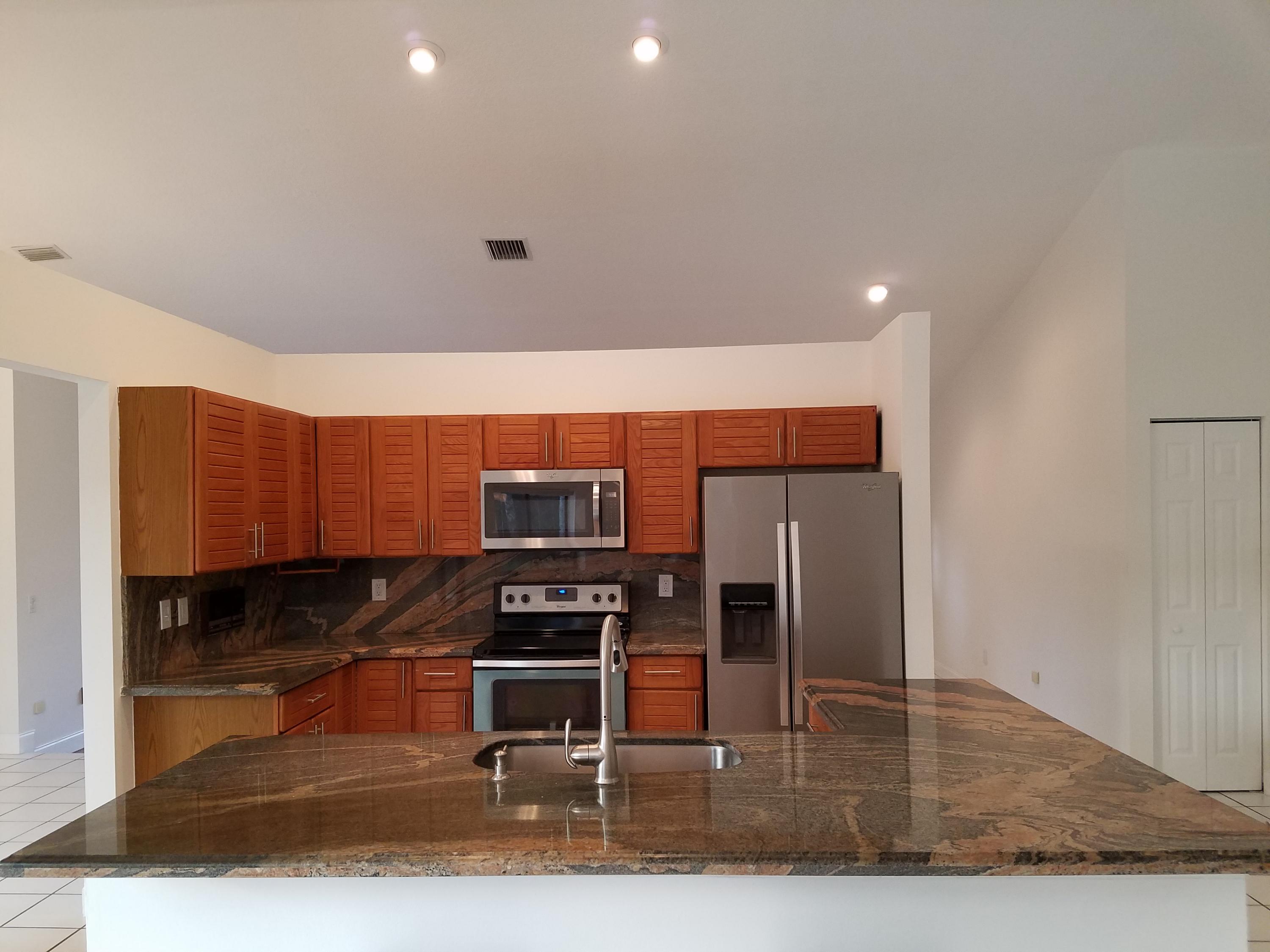 1680 Southwest 15th Street Boca Raton, FL 33486 - Photo 13 of 34 Vaulted Ceilings