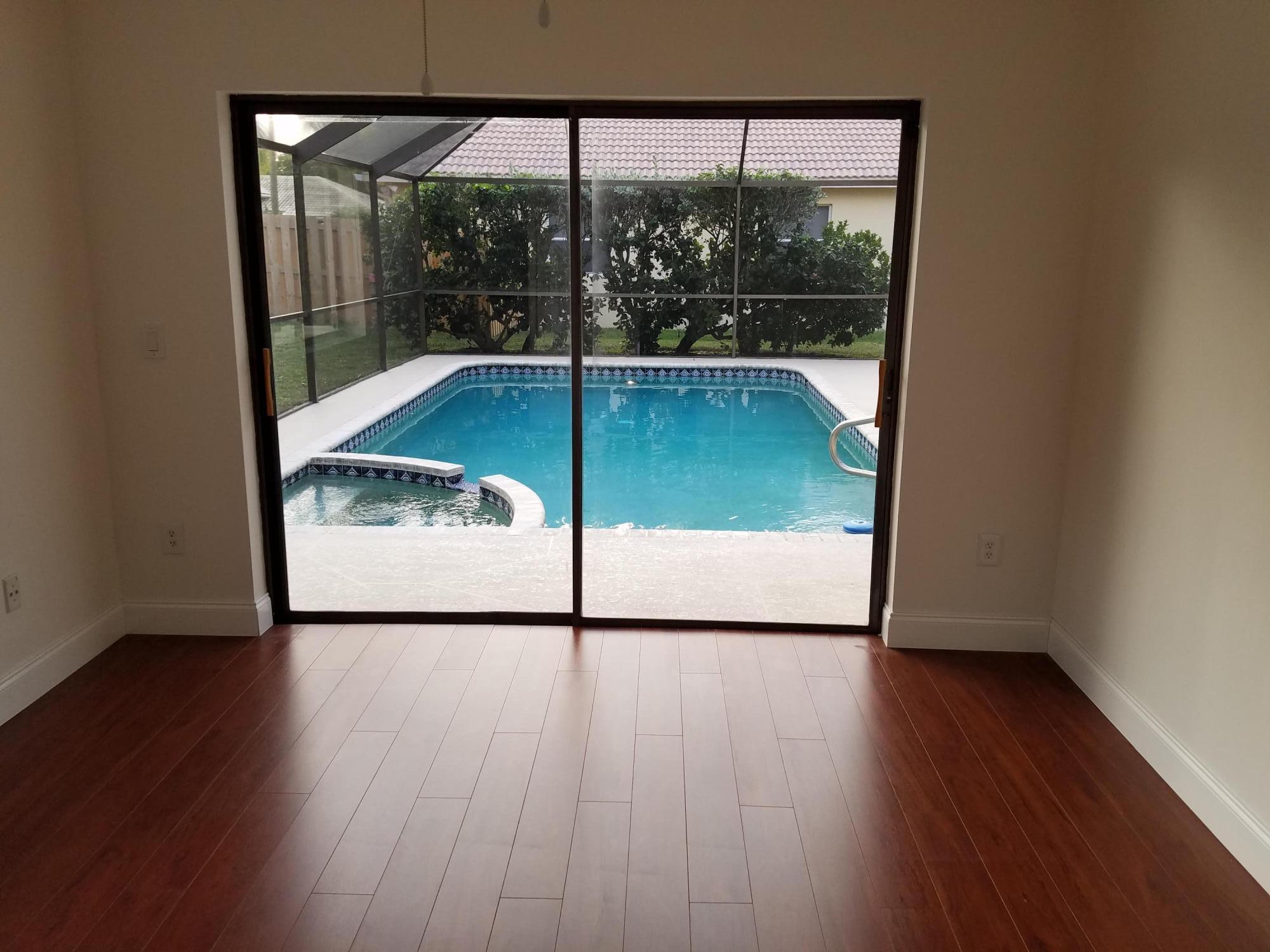 1680 Southwest 15th Street Boca Raton, FL 33486 - Photo 28 of 34 Second Bedroom w Walkin Closet