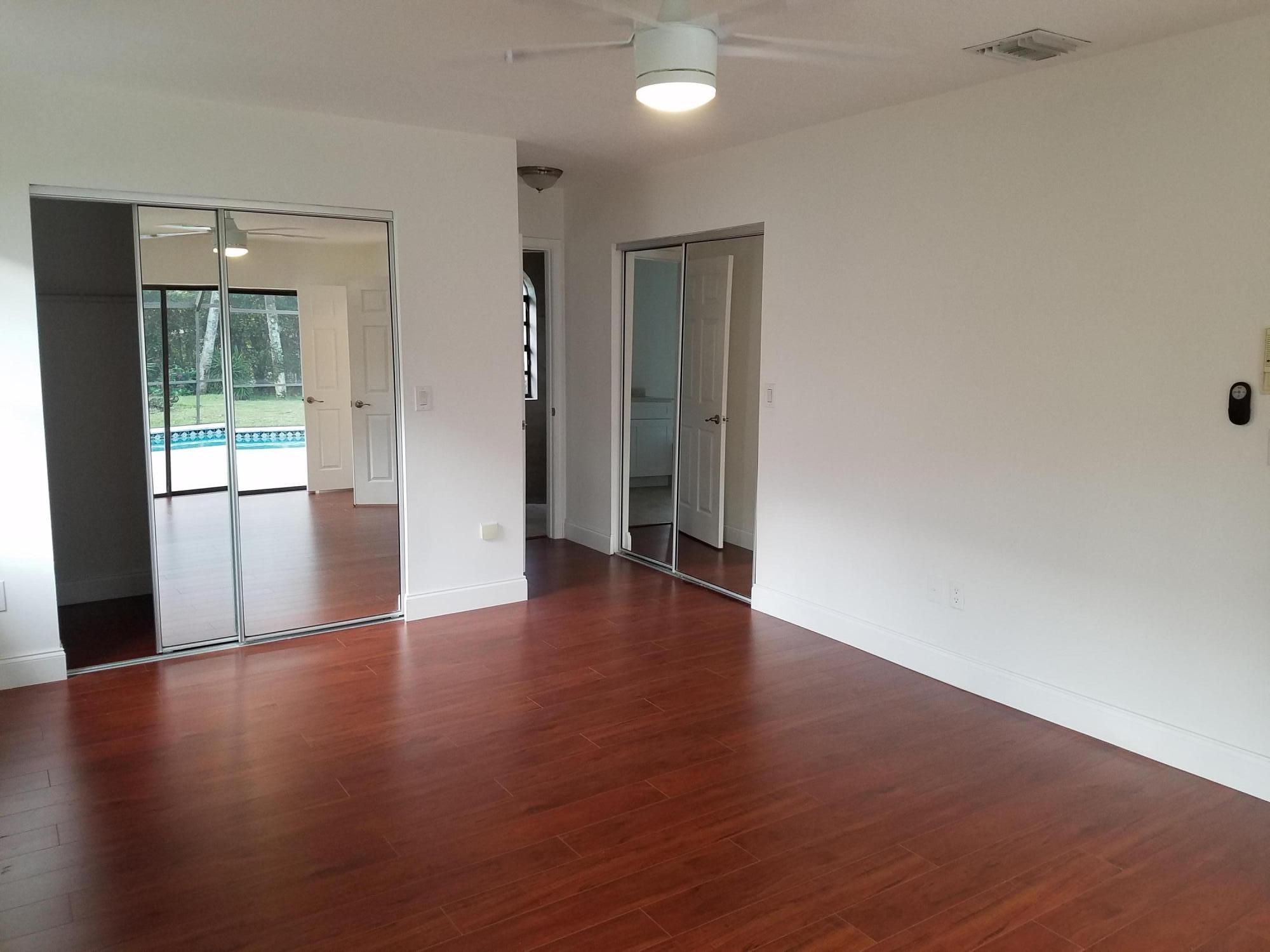 1680 Southwest 15th Street Boca Raton, FL 33486 - Photo 5 of 34 2 Walkin Closets in Master Bedroom