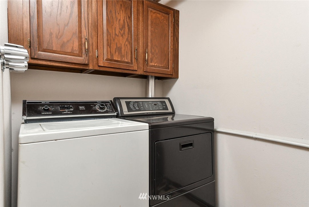 623 Main Street, Unit 3 Edmonds, WA 98020 - Photo 9 of 10 a utility room with dryer and washer