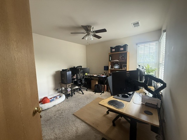 348 Fallbrook Court Schaumburg, IL 60107 - Photo 18 of 21 a view of a workspace with furniture and a window