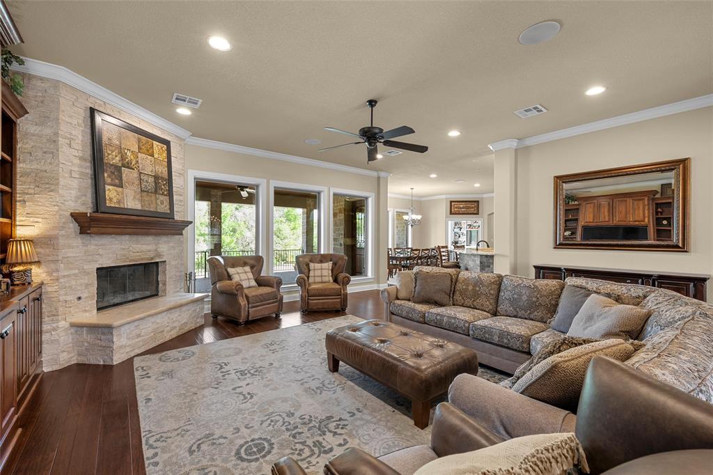14690 Chapel Road Lorena, TX 76655 - Photo 4 of 40 a living room with furniture and a fireplace
