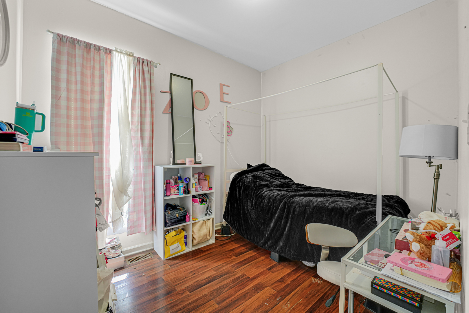 7222 South Rhodes Avenue Chicago, IL 60619 - Photo 12 of 22 a bedroom with a bed and a window