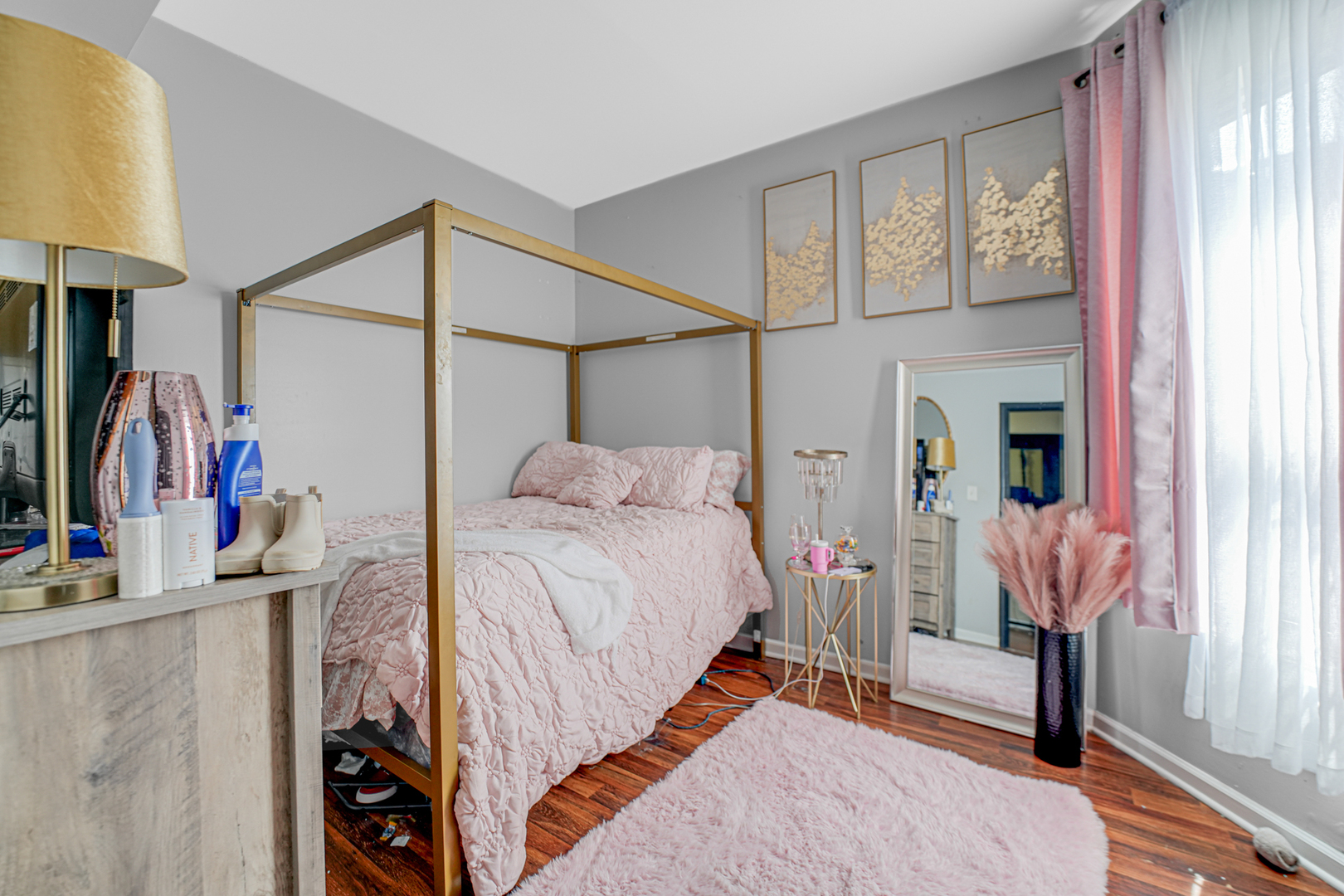 7222 South Rhodes Avenue Chicago, IL 60619 - Photo 16 of 22 a bed room with a bed and a walk in closet