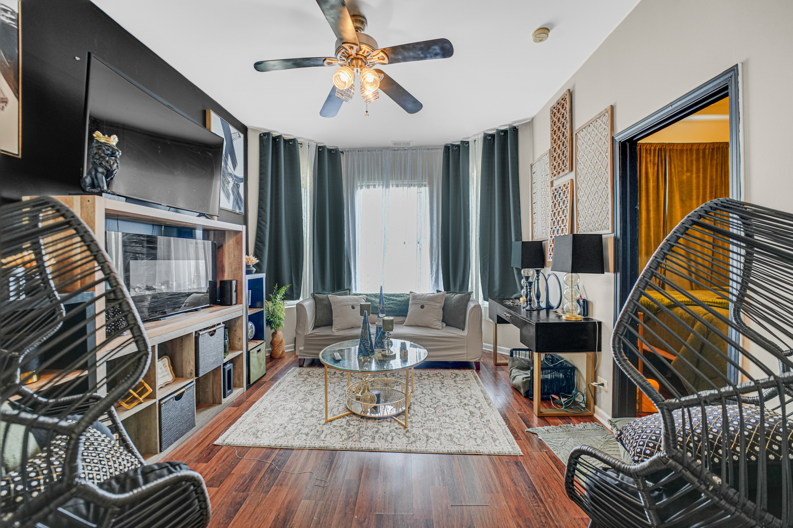 7222 South Rhodes Avenue Chicago, IL 60619 - Photo 5 of 22 a living room with furniture and a wooden floor