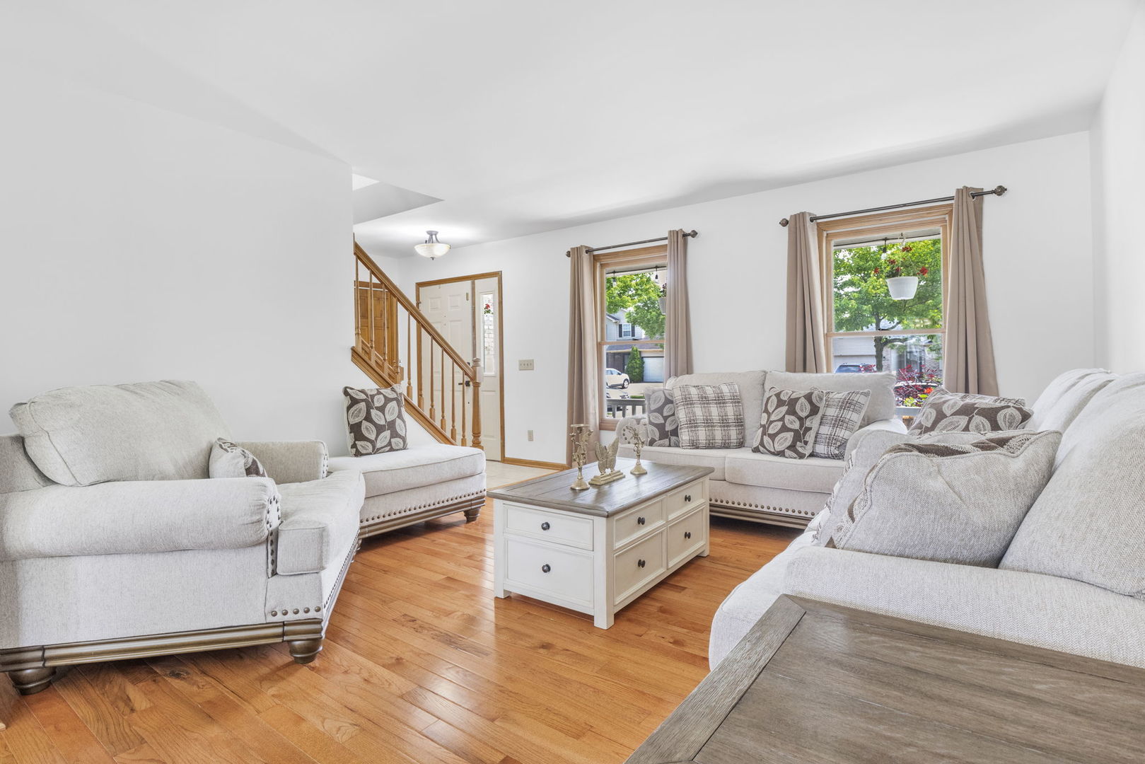 5207 Sunmeadow Drive Plainfield, IL 60586 - Photo 6 of 32 a living room with furniture and a large window