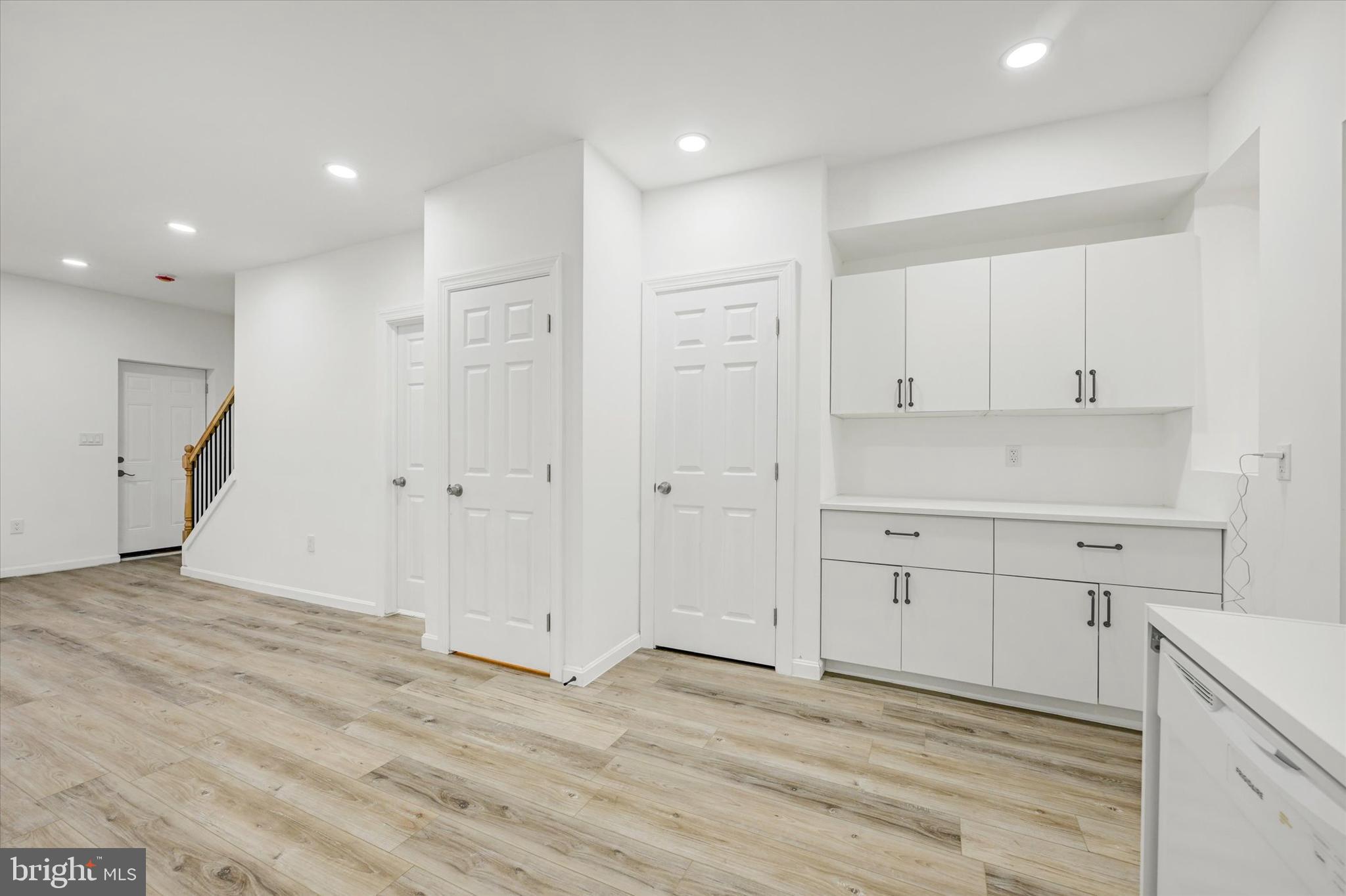 1604 Carswell Street Baltimore, MD 21218 - Photo 6 of 14 a view of a kitchen with white cabinets