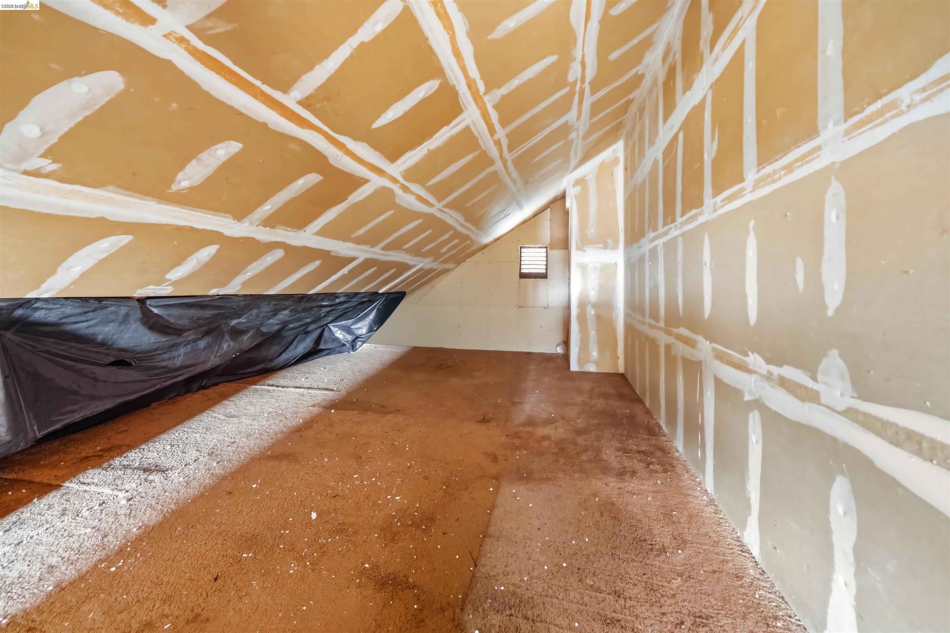 10933 Julius Street, Unit D Oakland, CA 94605 - Photo 22 of 28 View of unfinished attic