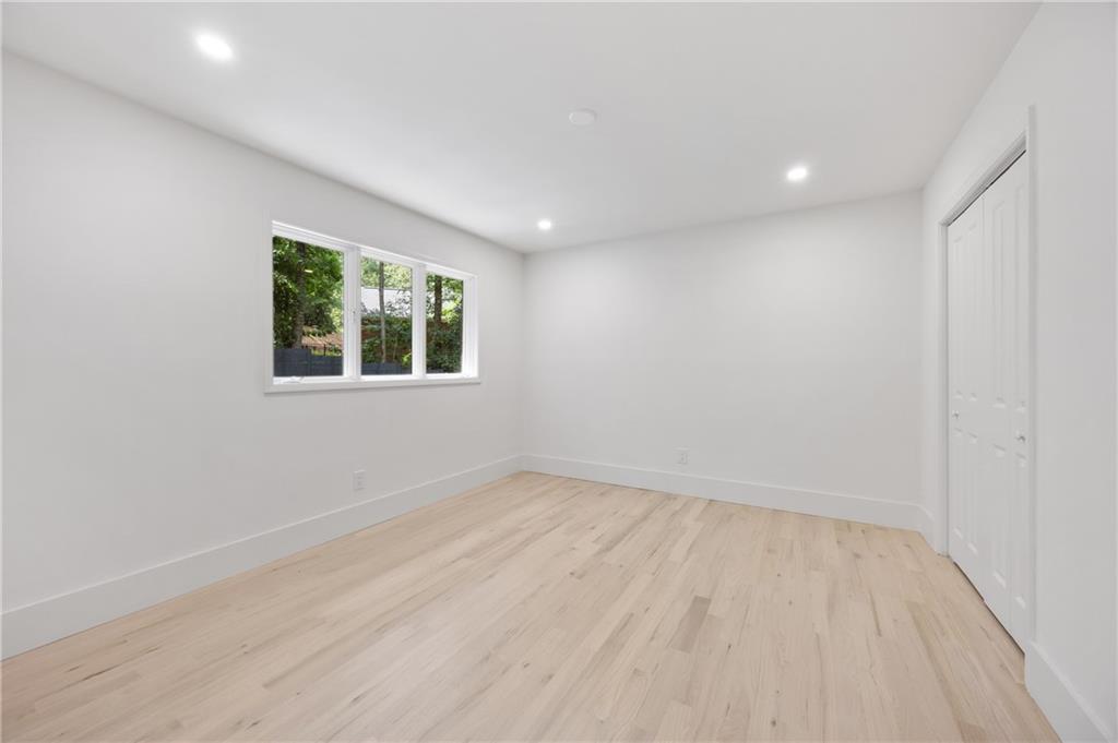 8120 Ball Mill Road Northeast Atlanta, GA 30350 - Photo 59 of 95 an empty room with windows