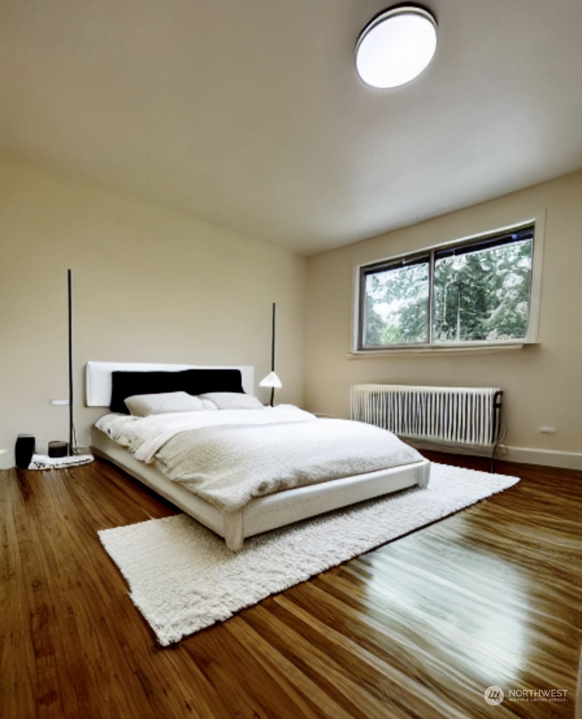 22925 49th Avenue Southeast Bothell, WA 98021 - Photo 19 of 40 a bedroom with double bed and a large window