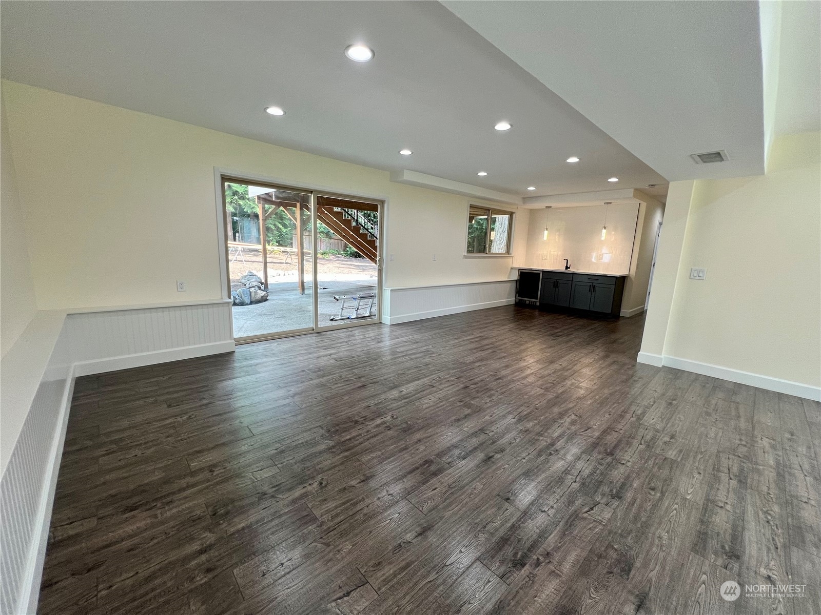 22925 49th Avenue Southeast Bothell, WA 98021 - Photo 26 of 40 a view of an empty room with wooden floor and a window