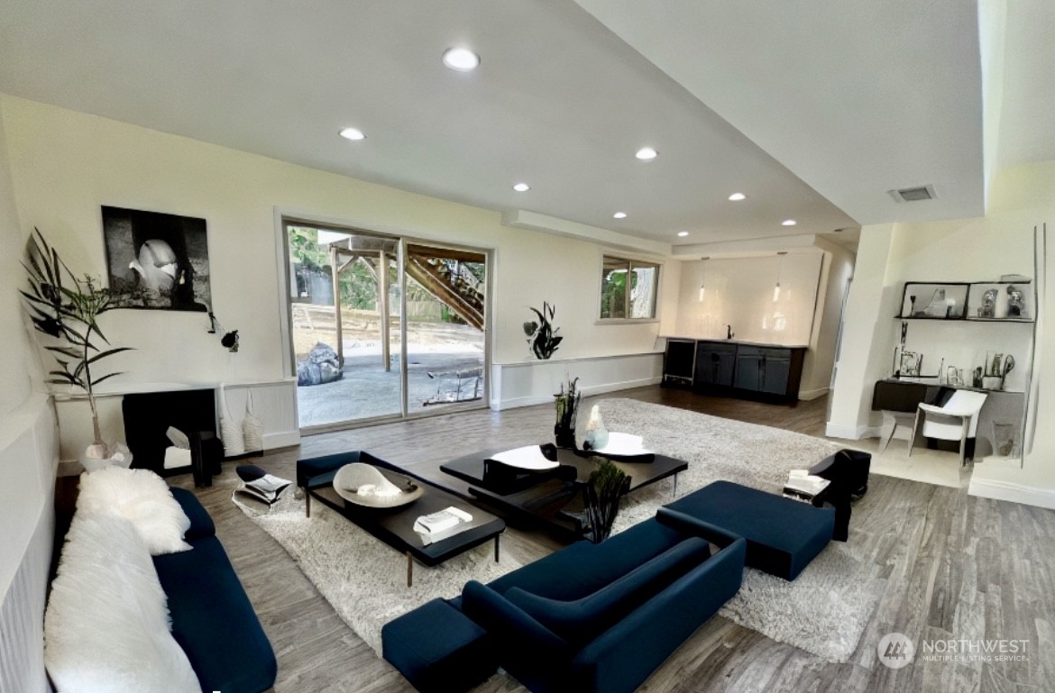 22925 49th Avenue Southeast Bothell, WA 98021 - Photo 27 of 40 a living room with furniture and a wooden floor