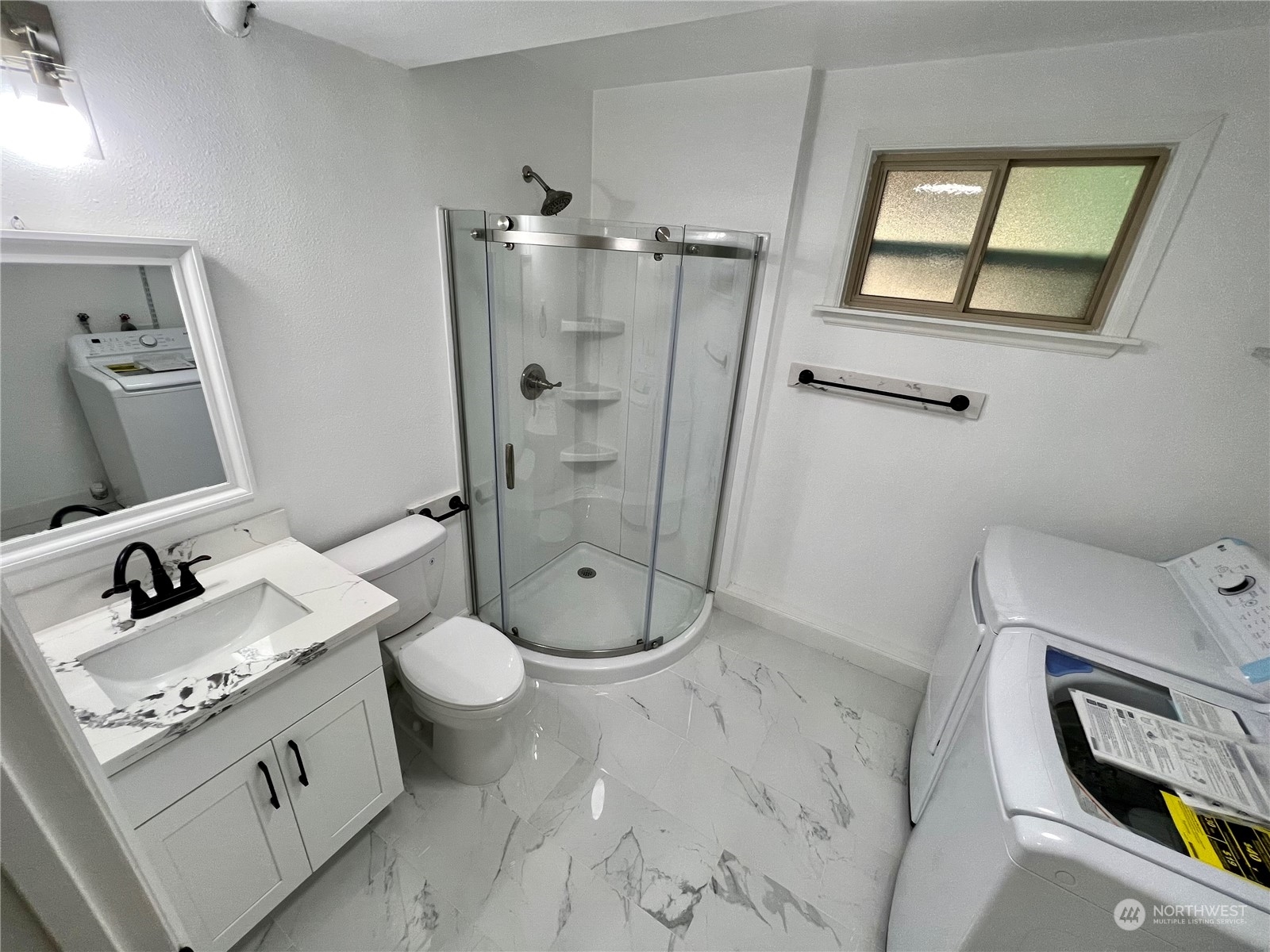 22925 49th Avenue Southeast Bothell, WA 98021 - Photo 34 of 40 a bathroom with a granite countertop sink toilet and shower