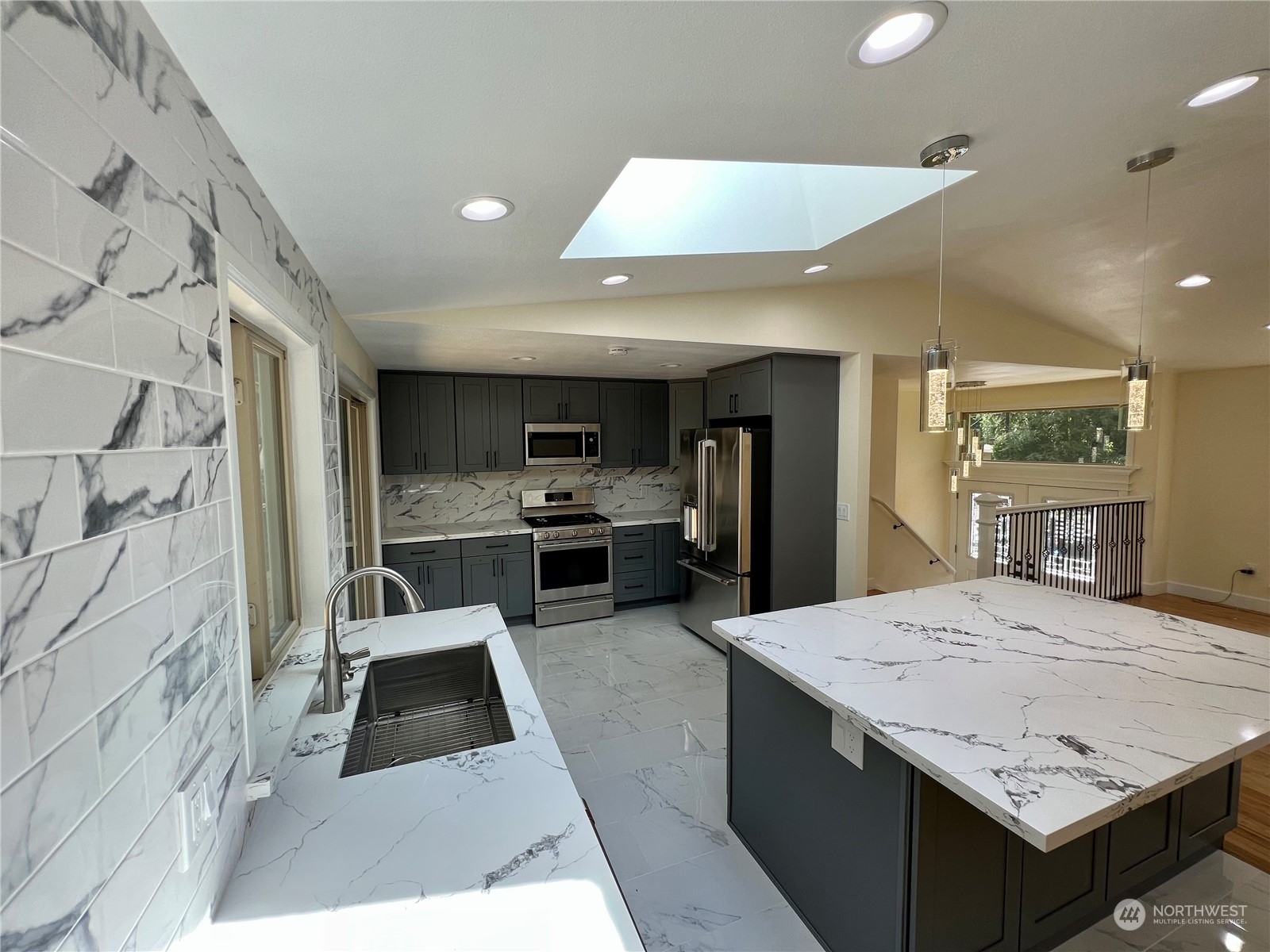 22925 49th Avenue Southeast Bothell, WA 98021 - Photo 9 of 40 a view of kitchen with sink microwave and refrigerator