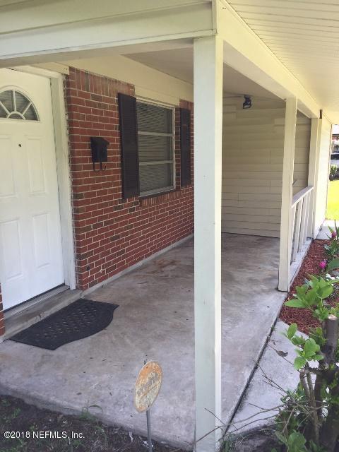 7391 Wheat Road Jacksonville, FL 32244 - Photo 3 of 26 a view of front door