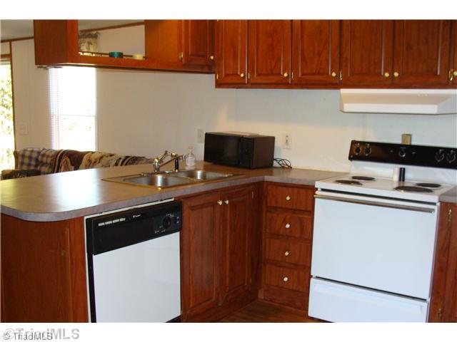 1203 Geeps Trail Road King, NC 27021 - Photo 8 of 16 Kitchen. Kitchen Looking towards Living Room