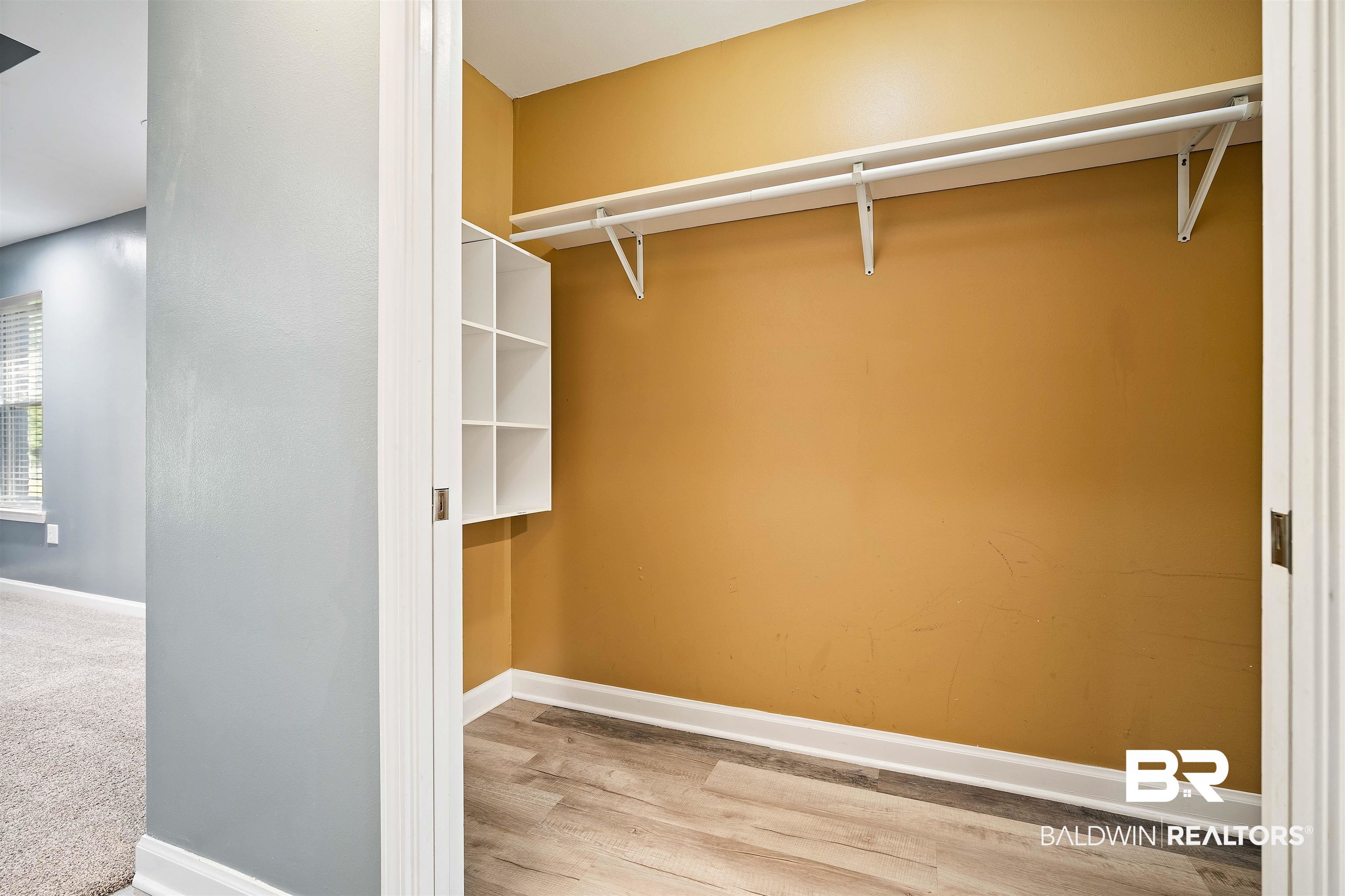 3010 Drag Strip Lane Coden, AL 36523 - Photo 20 of 44 Walk in closet with hardwood / wood-style floors